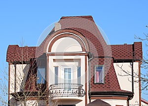 House with a roof made of metal sheets