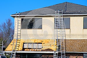 house roof repair shingles roof worker