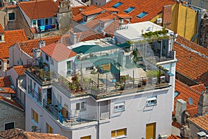 House with a rooftop terrace in Split old town, Dalmatia, Croatia. Densely populated downtown area photo