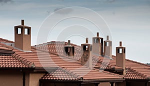 House rooftops with chimneys