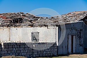 A house ruined during a artillery strike in Agdam by Armenian armed forces. Stop terrorism