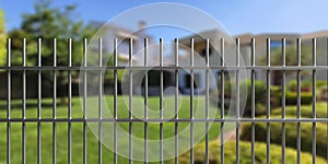 House safety. Metal fence with steel bars, blur residential building and garden background. 3d illustration