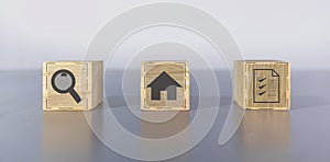 House search and inspection icon on wooden box light gray background,Study information before making a decision to choose