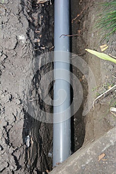 House septic pipe in the ground trench