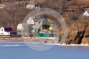 House on the shore of the frozen sea