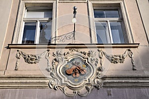 The House Sign of Old Prague in the Czech Republic - House at the Three Little Fiddles photo