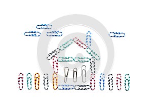 A house and sky of colored paper clips and three metall clips as family.