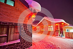 The house with snow in the China`s snow town