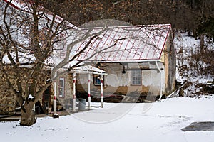 House on a snowy winter day, in a rural area of Carroll County,