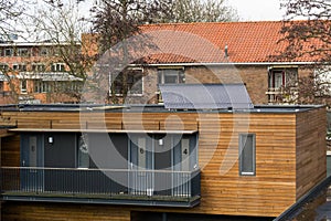 House with solar collectors on the roof. photo