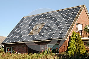 House with solar panel photo