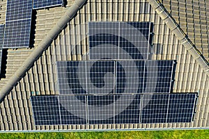 House with solar panel on the roof.