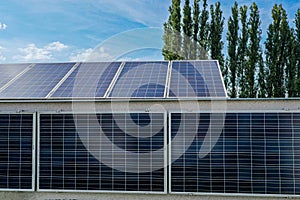 House with solar panel on the roof.