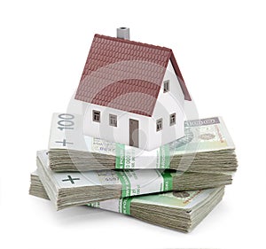 House on stack of polish zlotys