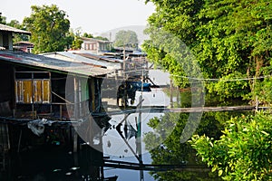 House on stilts. Views of the city's Slums from the river