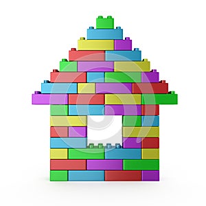House symbol build with colorful plastic blocks