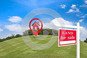 House symbol with location pin icon on earth and green grass in real estate sale or property investment concept