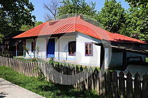 House with tin roof in Dimitrie Gusti National Village Museum in Bucharest photo