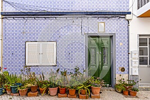 A house with traditional Portuguese tiles in Olhao, Portugal