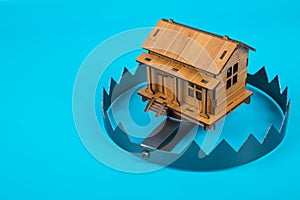 A house in trap. Concept risk in real estate.