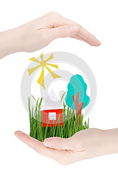 House, tree, the sun and grass in hands