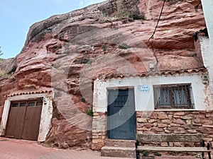 house tucked into a rock in the town of Checa, Guadalajara photo