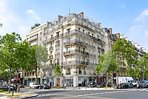 House with typical french balconies in Paris, France