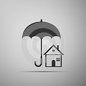 House with umbrella icon isolated on grey background. Real estate insurance symbol. Real estate symbol