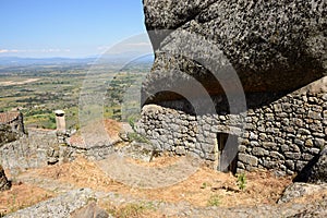 House under boulder