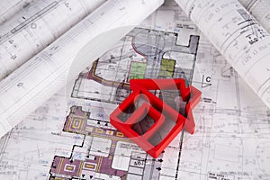 House under construction, blueprints concept