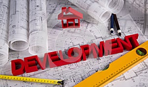 House under construction, blueprints concept