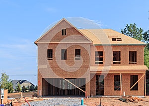 A House under construction in a subdivision.