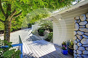 House with uphill driveway