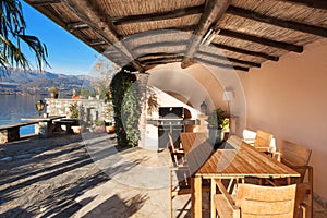 House, veranda at sunset