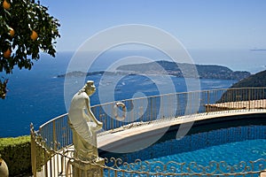 House villa with statue over pool view