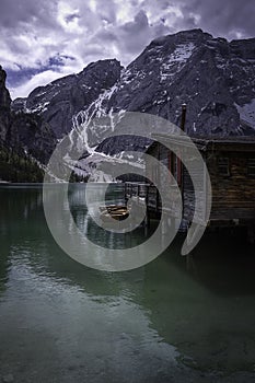 House in water at Lake Braies in the Dolomites, near Cortina D`Ampezzo