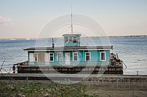 House on the water in summer horizontal