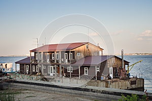 House on the water in summer horizontal