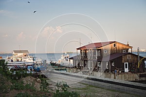 House on the water in summer horizontal