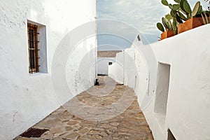 House with white Mediterranean walls with the sea in the background on the islands - Image