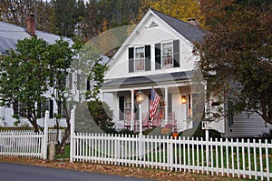 House with white picket fence photo