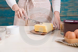 House wife wearing apron making. Steps of making cooking chocolate cake.