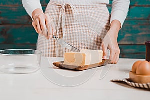 House wife wearing apron making. Steps of making cooking chocolate cake.