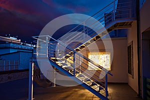 House window light glow in a thunder storm