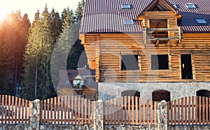 House in winter forest