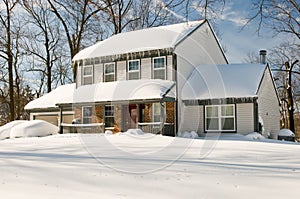 House after winter snowstorm