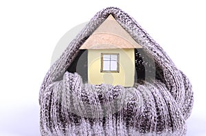 House wrapped in wool scarf