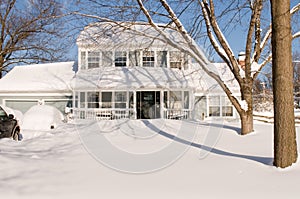 House and yard after snowstorm