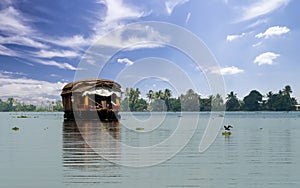 Houseboat cruising in the Backwaters, Kerela , India photo