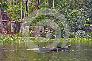 Houseboats on the backwaters of Kerala in Alappuzha Alleppey in India. A traditional tourist attraction is the house-boat on the